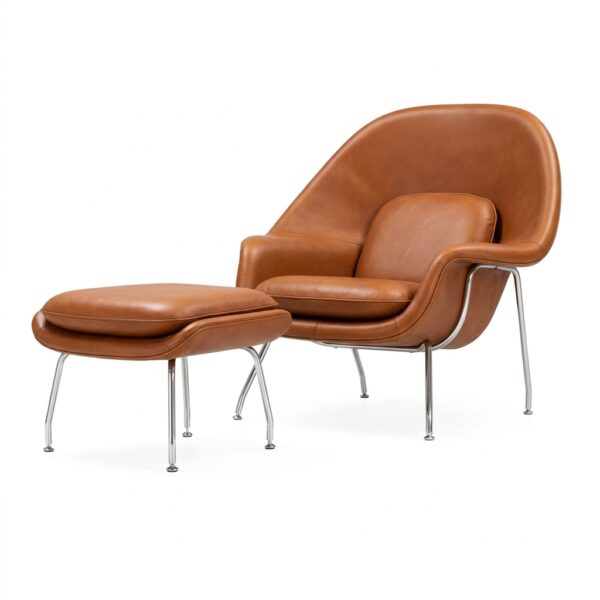 Poltrona Womb Chair Couro Natural com Puff Pé Cromado